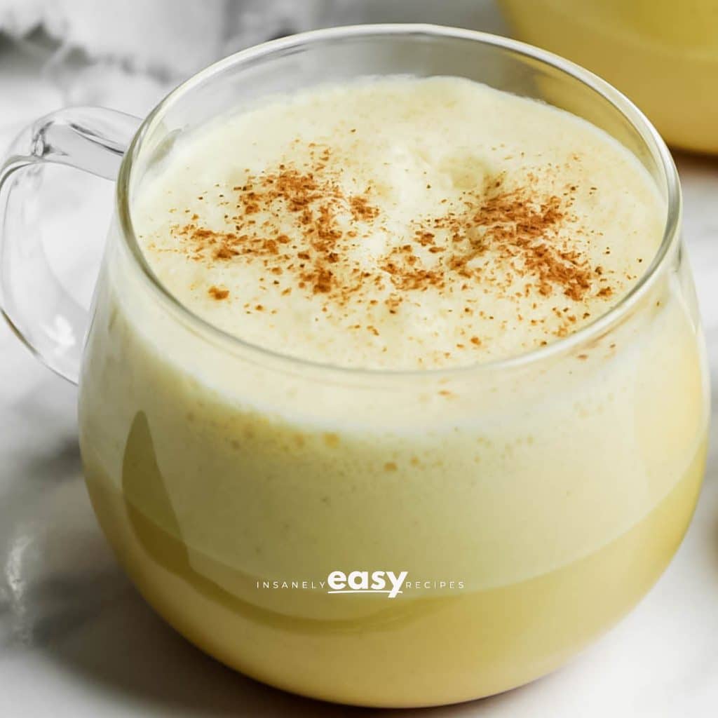 Closeup photo of Turmeric coffee in a glass mug