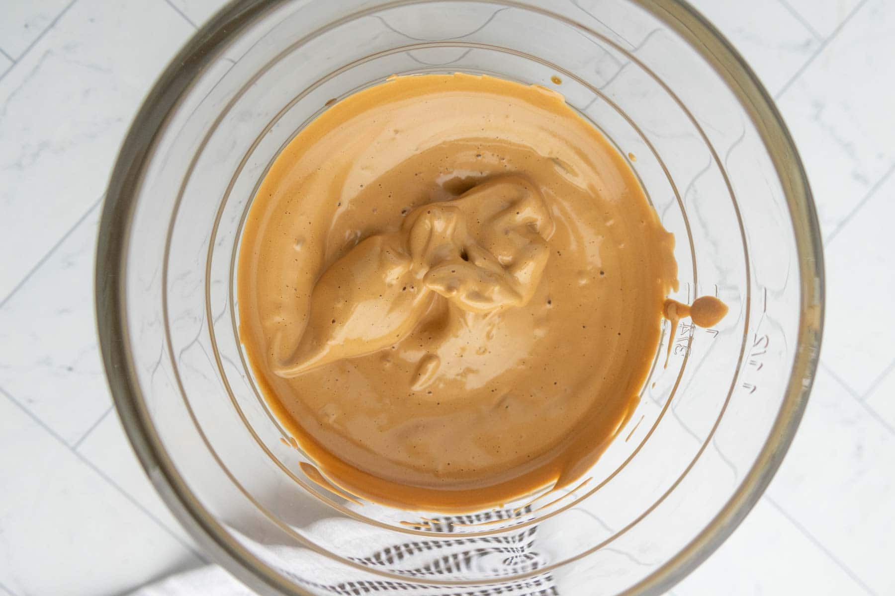 Whipped coffee in a glass bowl.