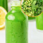 A glass bottle filled with green juice sits in front of a sliced lemon, with an inset showing chopped cucumber, spinach, lemon, and ginger. Text reads “Green Juice.”.